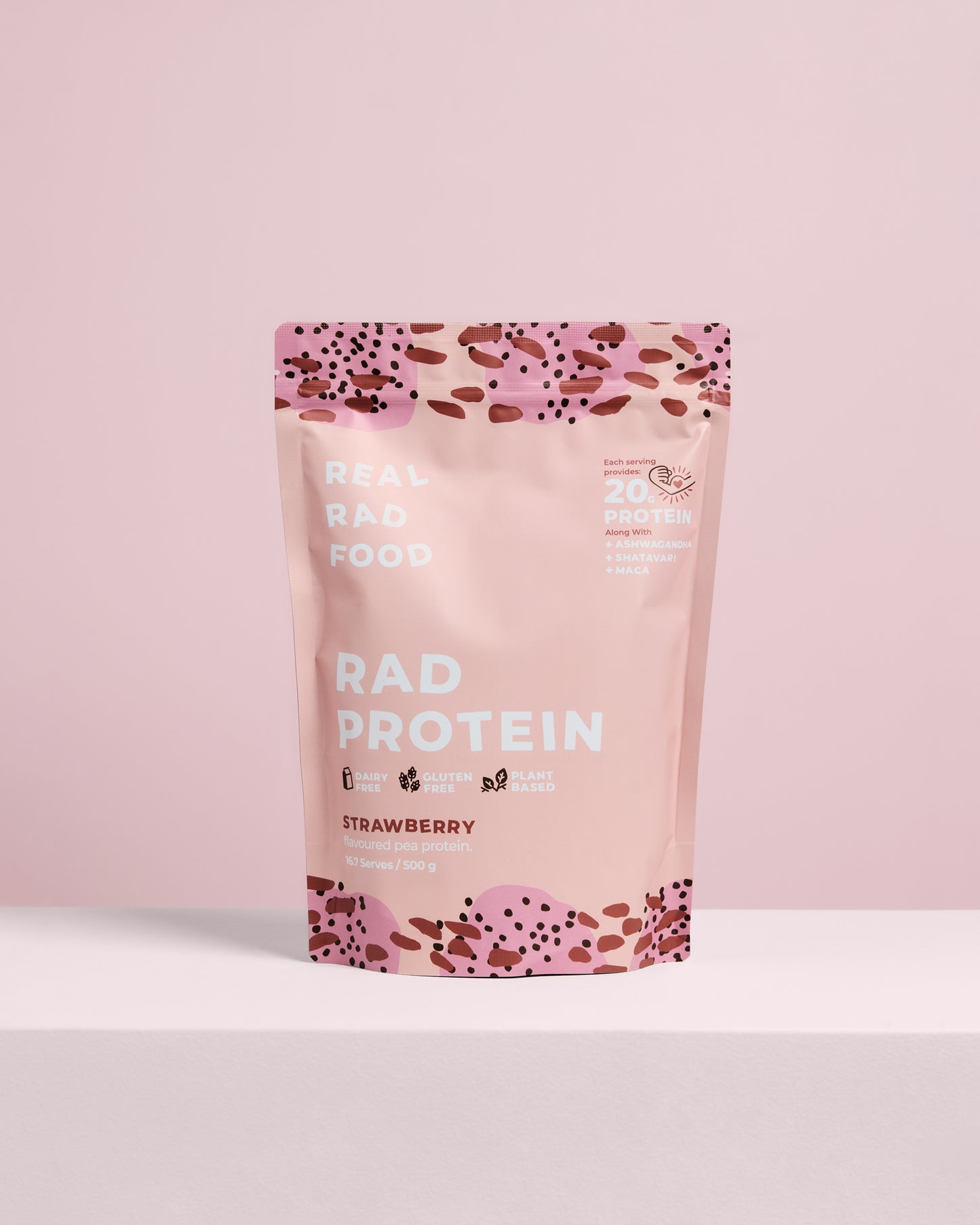 Package of RAD Protein Strawberry flavour on a pink background